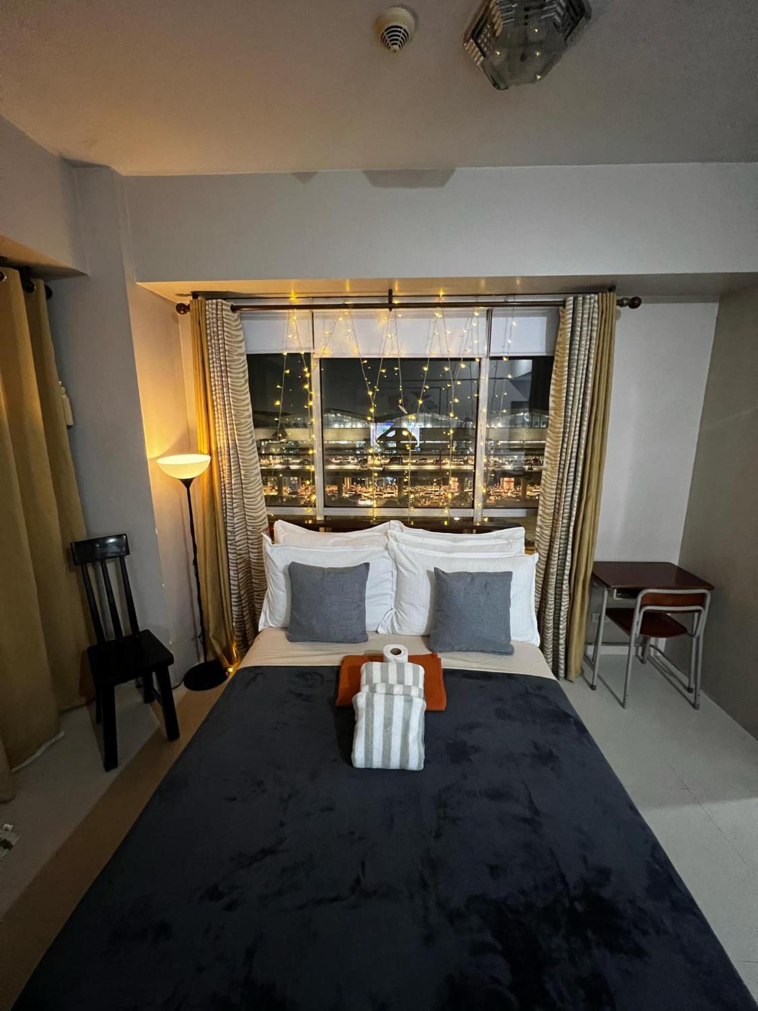 One Palm Tree Villas Condominium - Studio 7Th Fl With Balcony - Across Terminal 3 Airport パサイ エクステリア 写真
